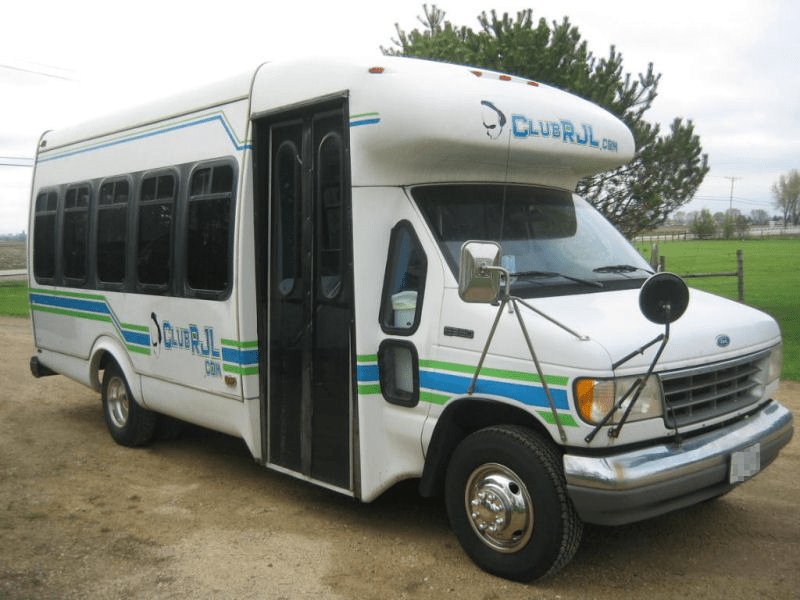 Club RJL party bus exterior with custom Club RJL graphics